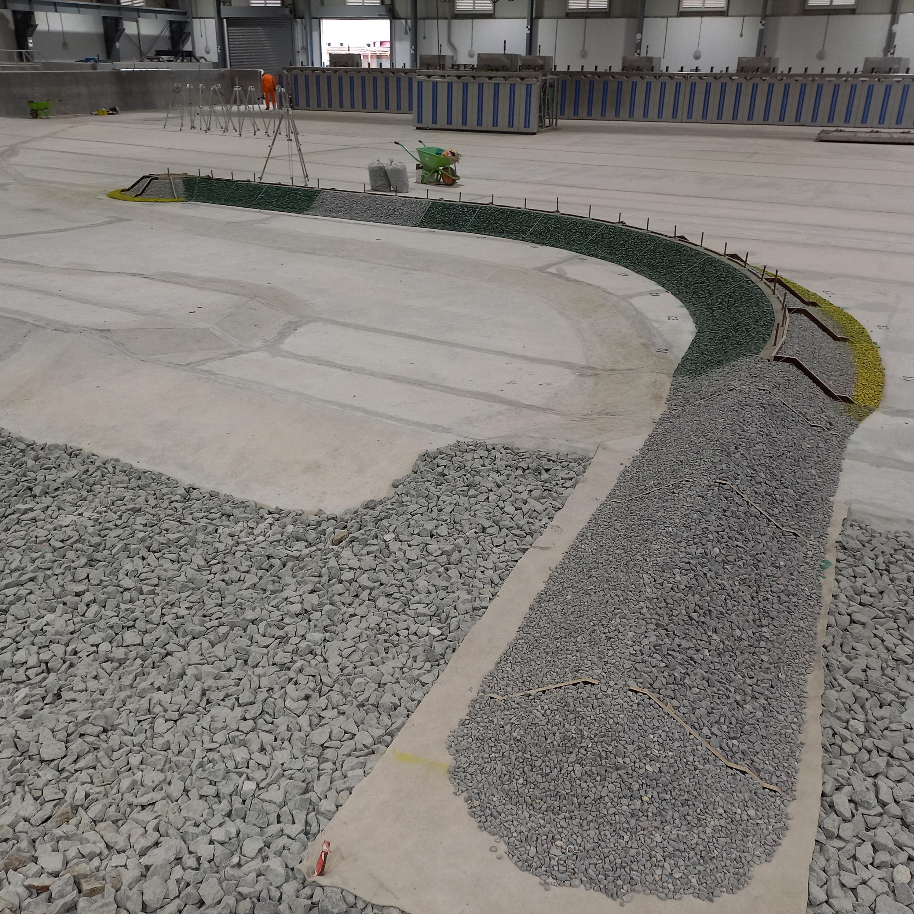 Marina rubble mound breakwater physical model in the 3D basin