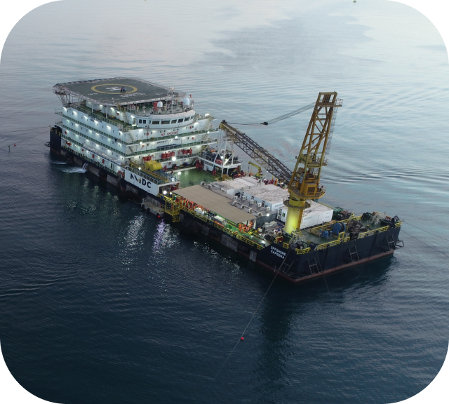 Support vessel and workboat at sea